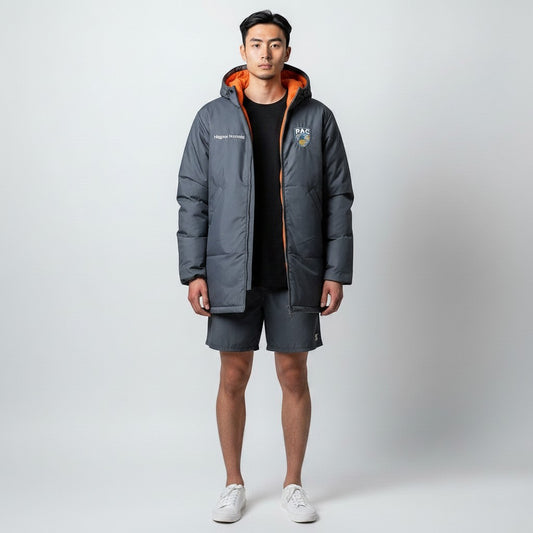 The Swim Guy Online Store grey waterproof nylon parka with orange lining, PAC logo on chest, and custom name embroidery.