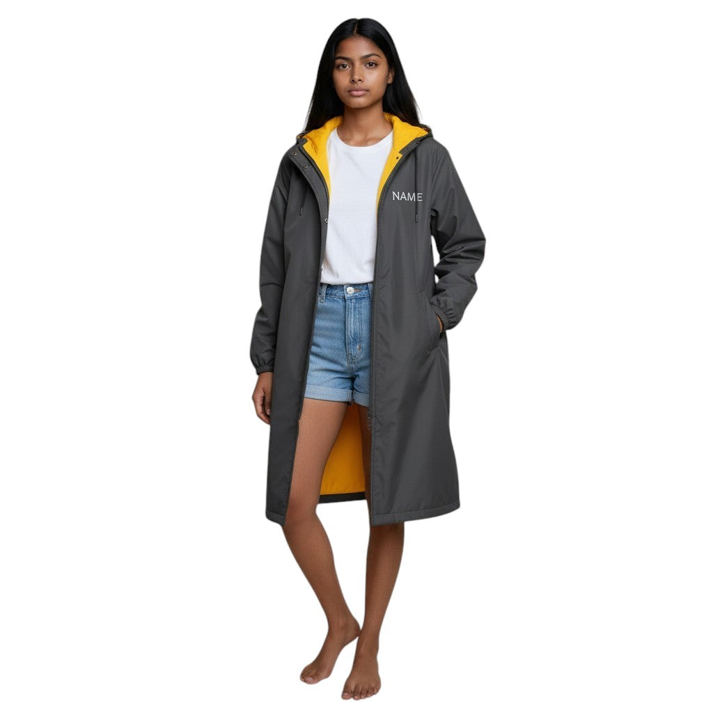 The Swim Guy Online Store black aquatics parka with gold lining and customizable white name on front chest