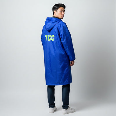 The Swim Guy Online Store Claremont Club royal blue team parka with lime green TCC back lettering and grey lining.