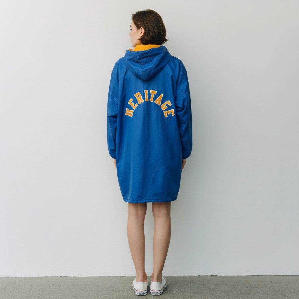 The Swim Guy Online Store Heritage High School royal blue waterproof nylon team parka with gold arched back lettering