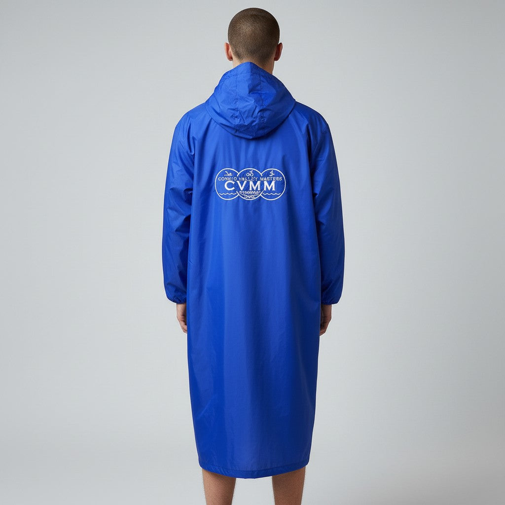 The Swim Guy Online Store royal blue masters team parka with white CVMM logo on the back, worn by a male model.